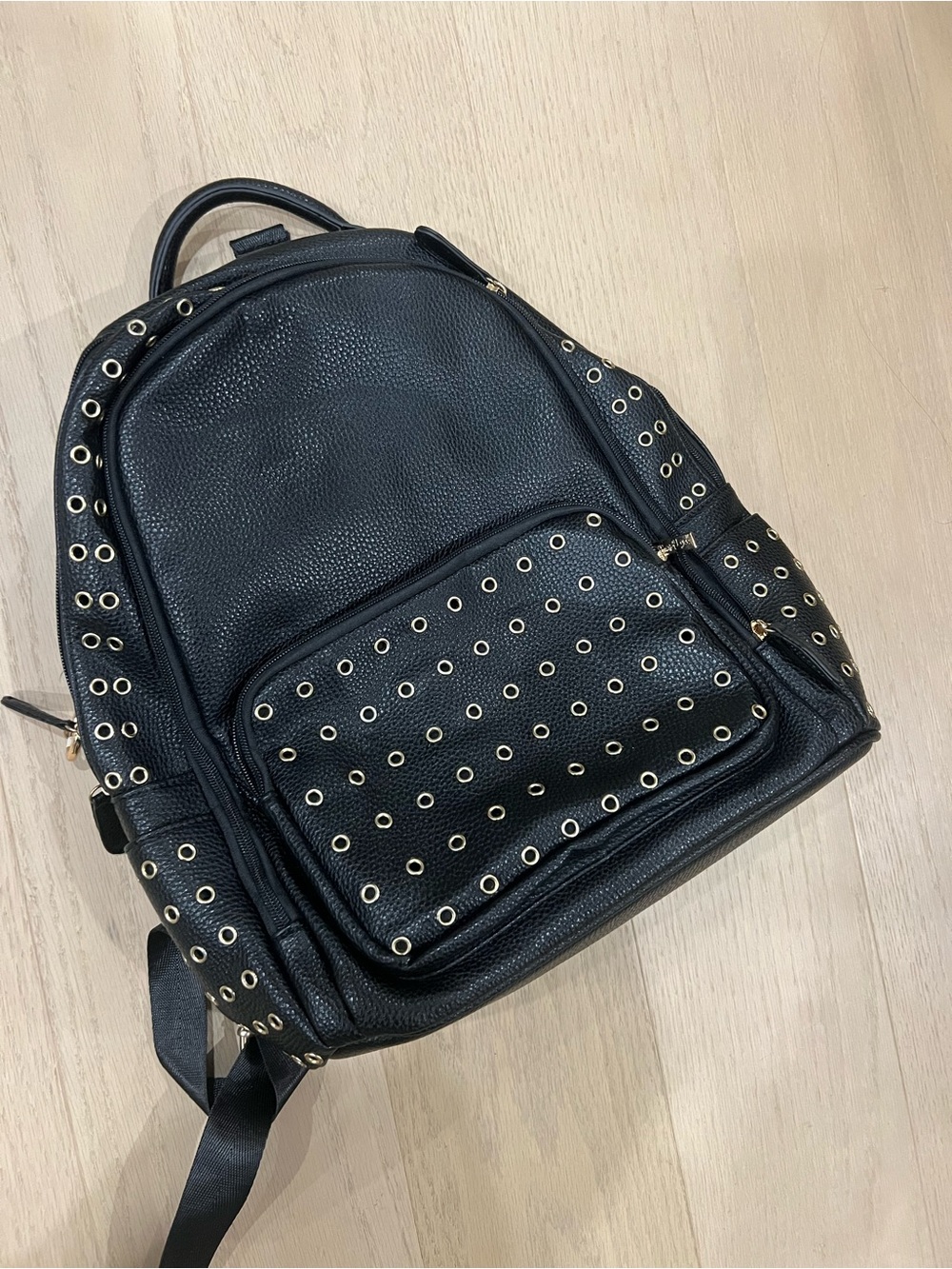 Black Grommet Accent Faux Leather Backpack